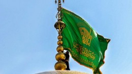 اهتزاز پرچم سبز رضوی بر فراز گنبد امام رضا (ع)و نواختن نقاره ها